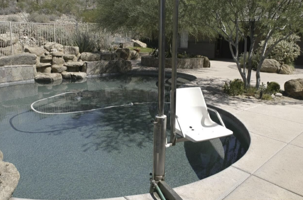 Outdoor space showing an accessible lift for a pool