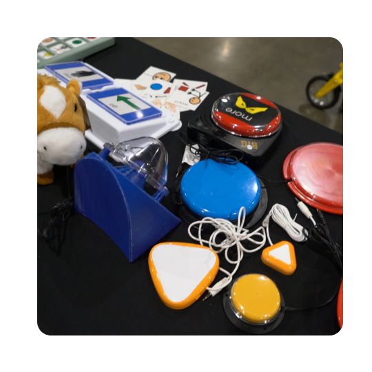 Colorful assistive devices are on display in the AT Showcase.