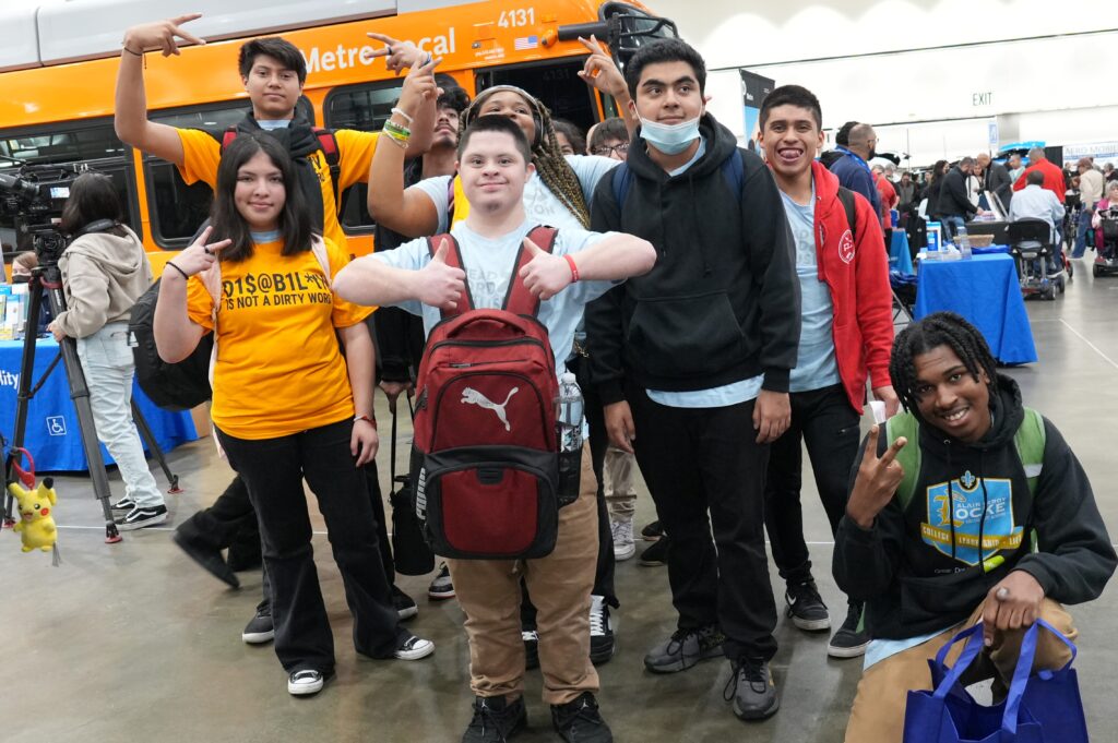 Group shot of teenagers with intellectual and developmental disabilities at Abilities Expo.