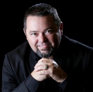 Headshot of a smiling Mark Scott