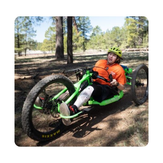 A man is in an adaptable mountain bike