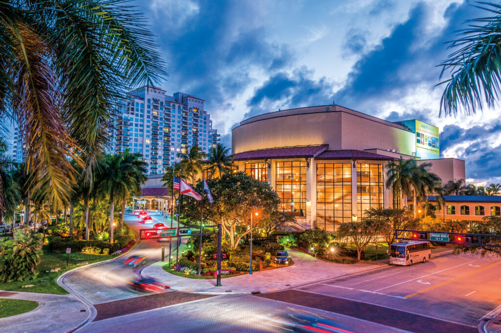 Broward County Center for Performing Arts under a dramatic cloudy sky.