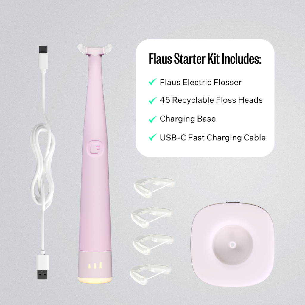 A pink Woven electric flosser is shown
