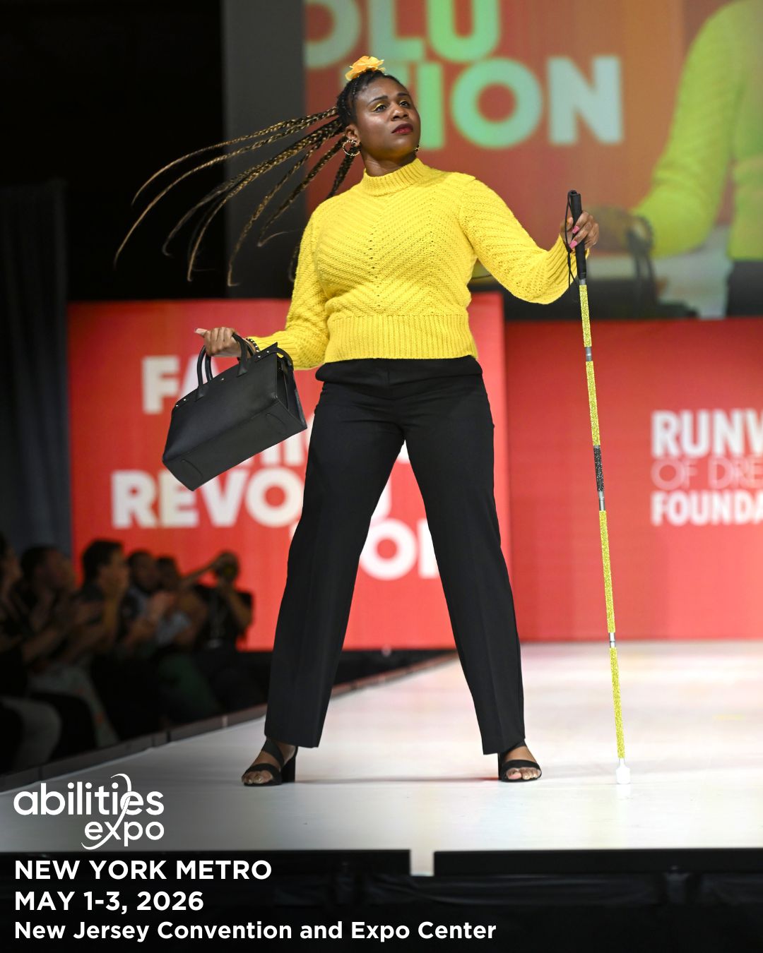 Model, Lachi, is shown on a runway.