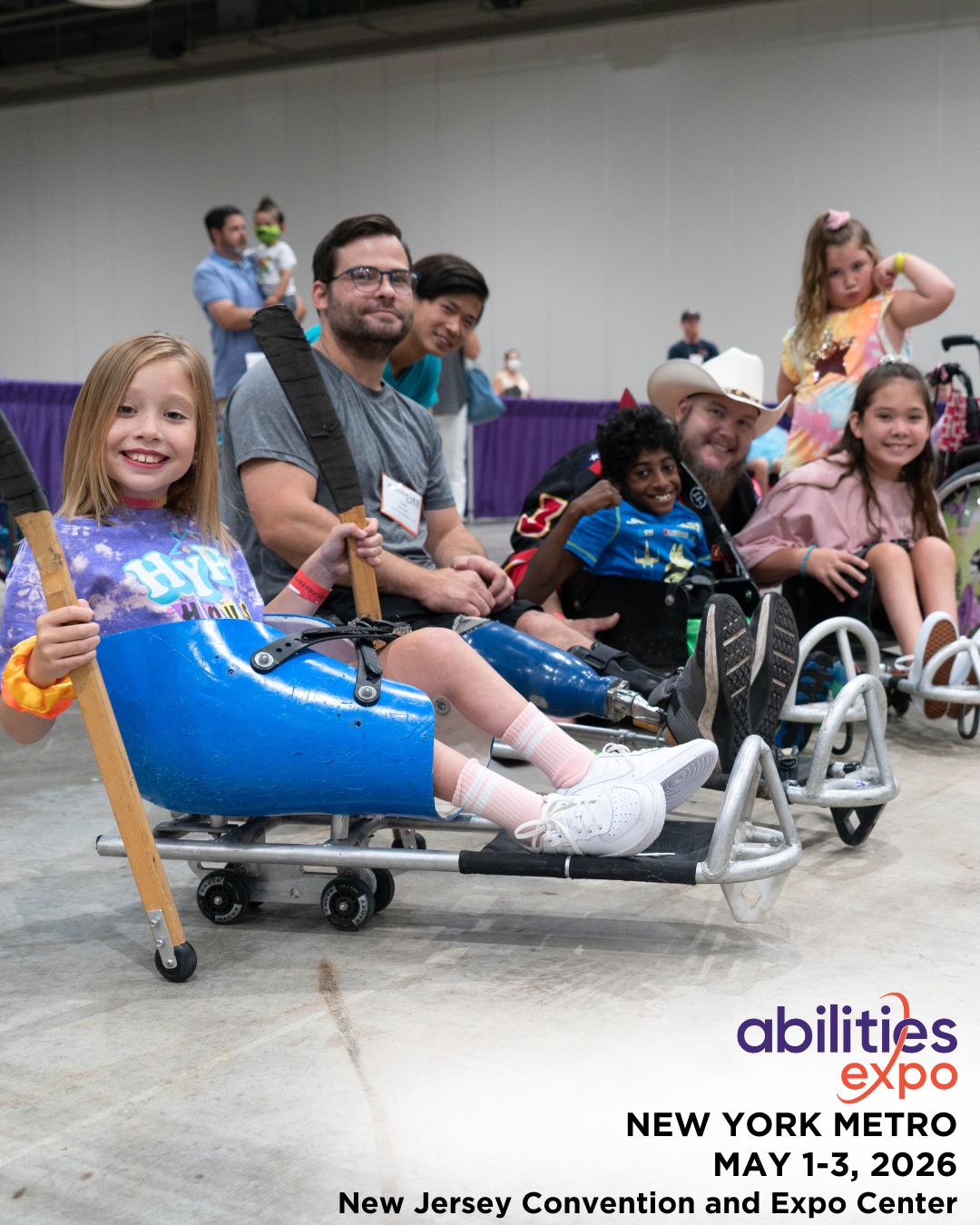 A group of people try their hand at adaptive hockey at the Abilities Expo.