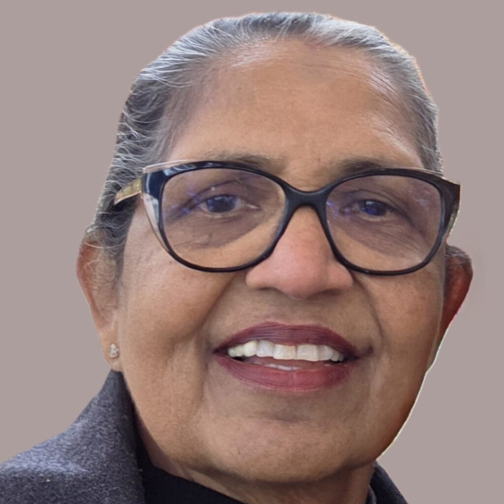 Headshot of a smiling Jani Nayar