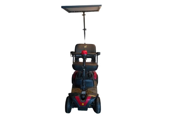 The Mobility Scooter Roof from Nancy and Dave Scooter Accessories on a scooter.