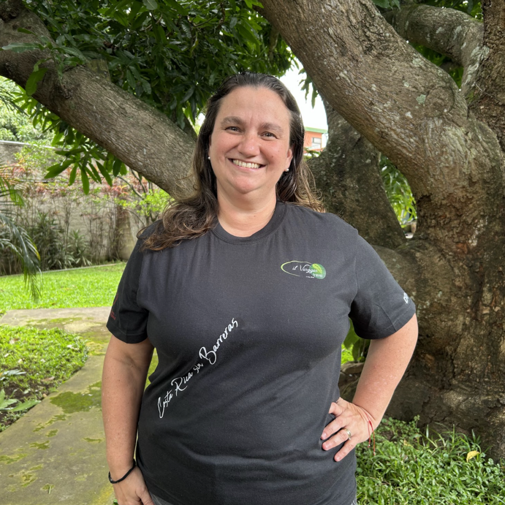 Photo of a smiling of Stephanie Sheehy outside in front of a tree