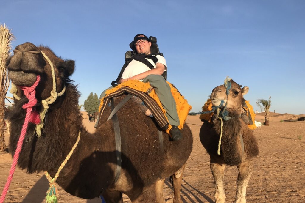 Cory Lee riding camels in Egypt