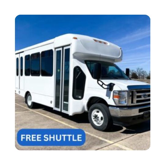 An image of a shuttle that reads 'free shuttle' in the corner
