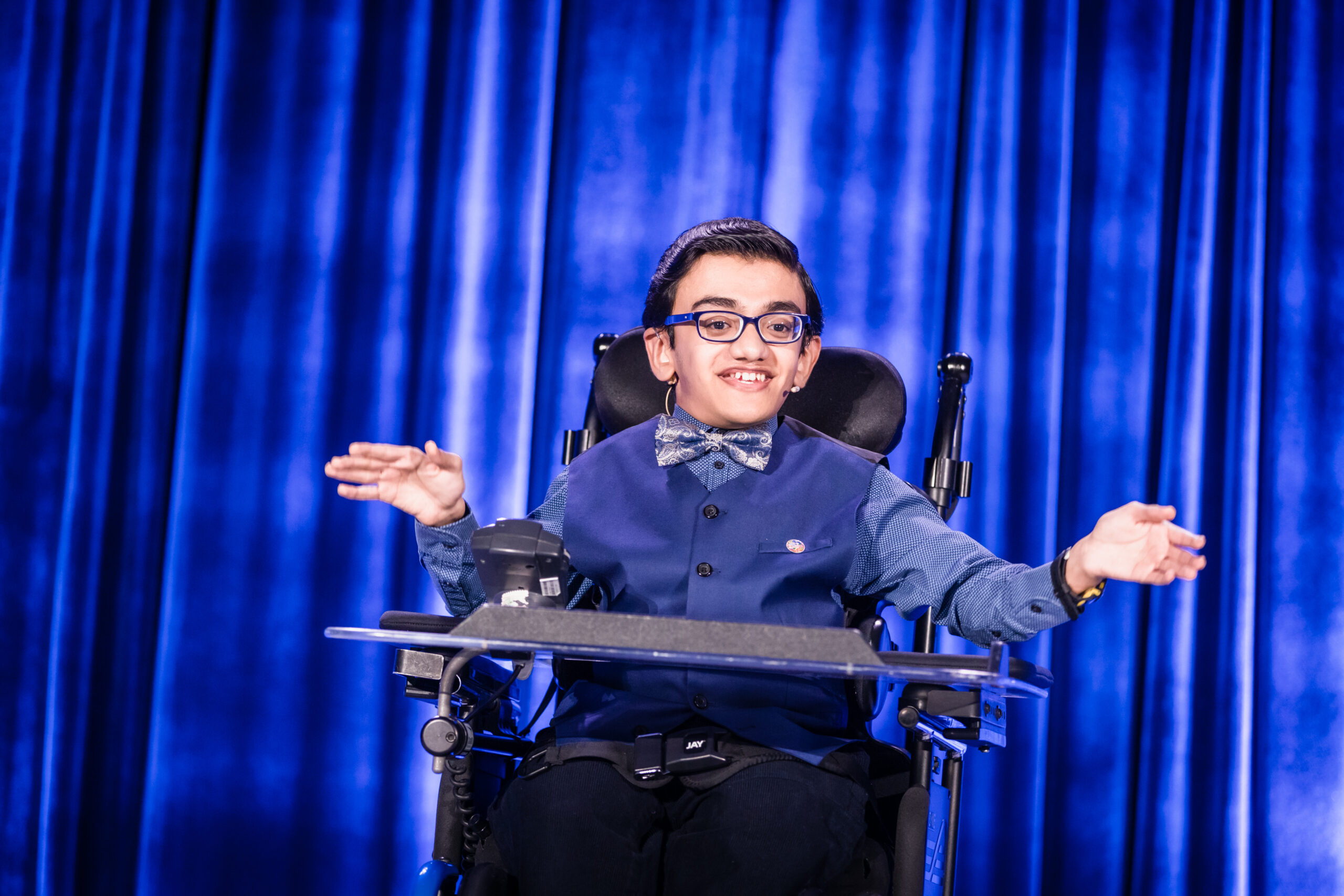 Shot of Sparsh Shah speaking onstage