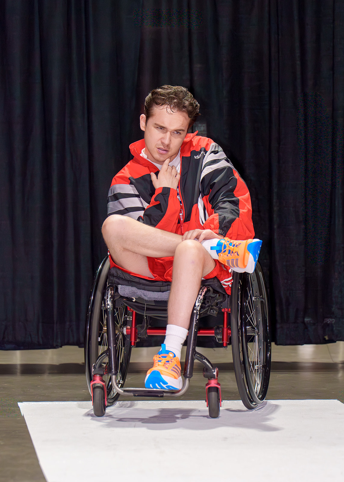 A model posing for the Runway of Dreams Fashion Show