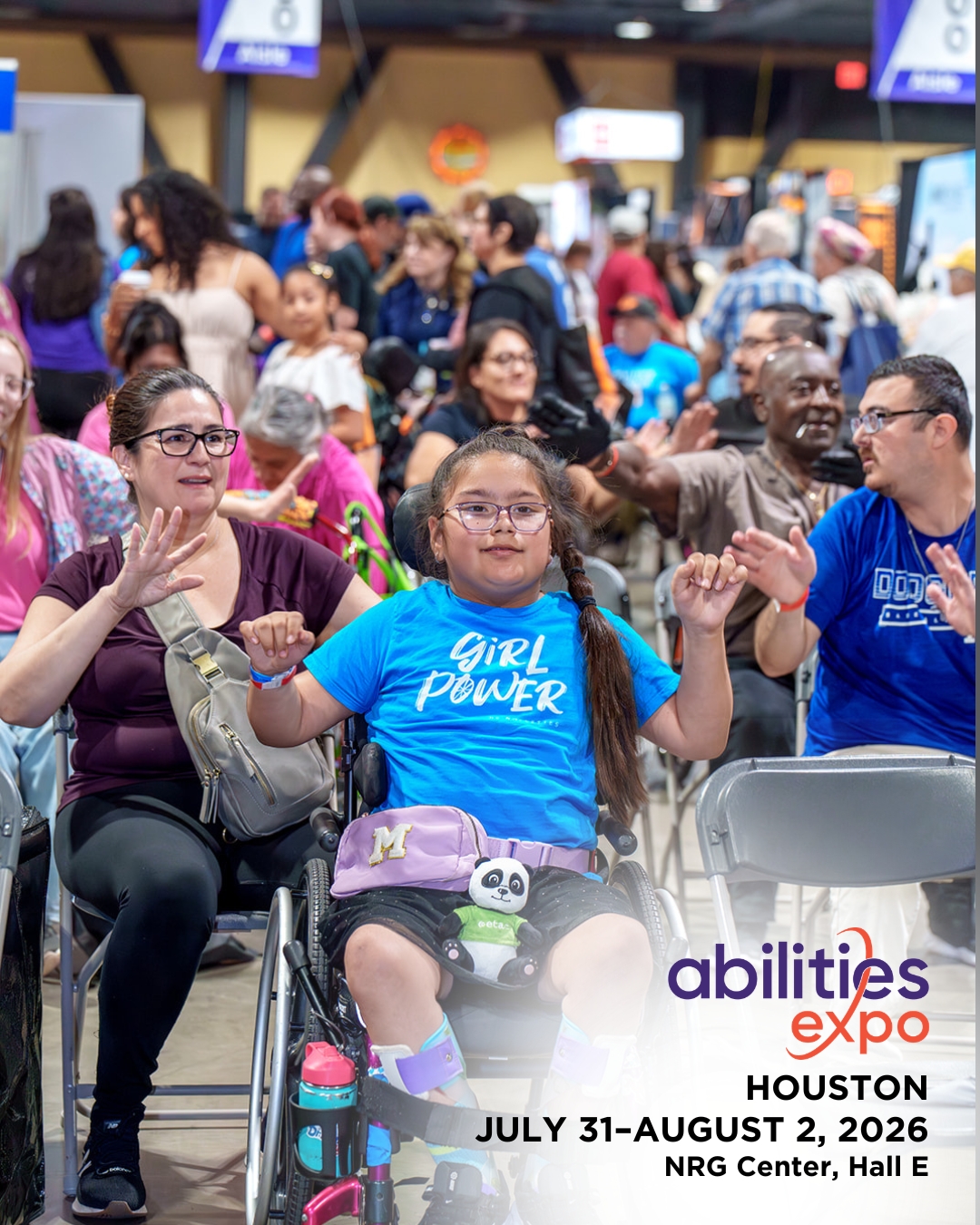 A crowd of people cheer in the events arena at Abilities Expo. The bottom corner reads 'abilities expo Houston, July 31-august 2, 2026, NRG Center, Hall E.'