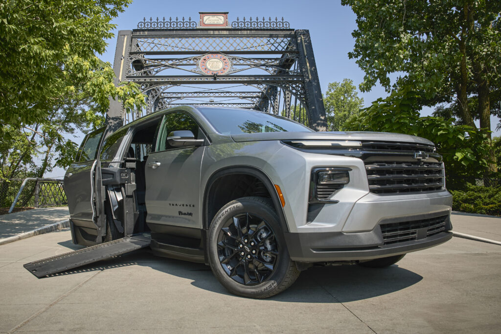The Next Gen Traverse is shown in front of a bridge