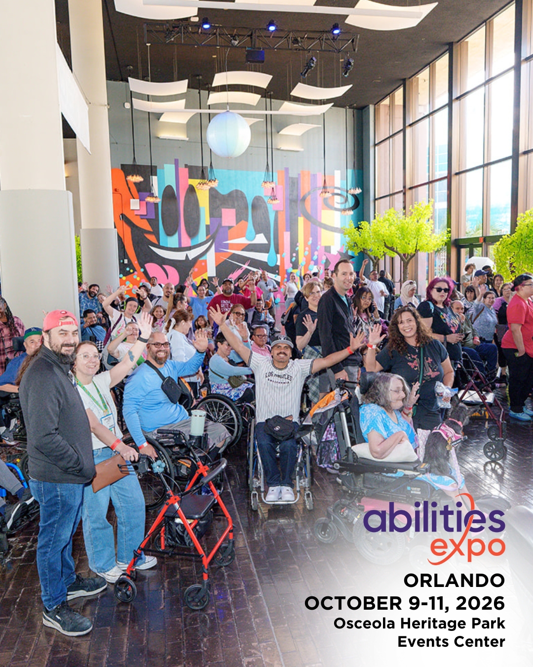 A large group of Abilities Expo attendees smile for a photo. The bottom right corner reads "abilities expo, Orlando, August 9-11, ORLANDO OCTOBER 9-11, 2026, Osceola Heritage Park Events Center."