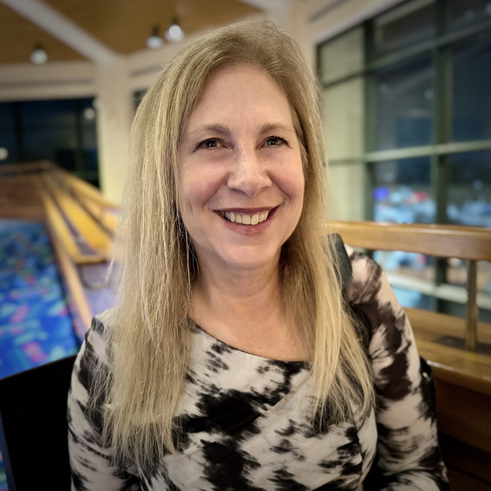 A headshot of Beth Kofsky, Executive Director of Housing and Assistive Technology, Inc. (HAT)